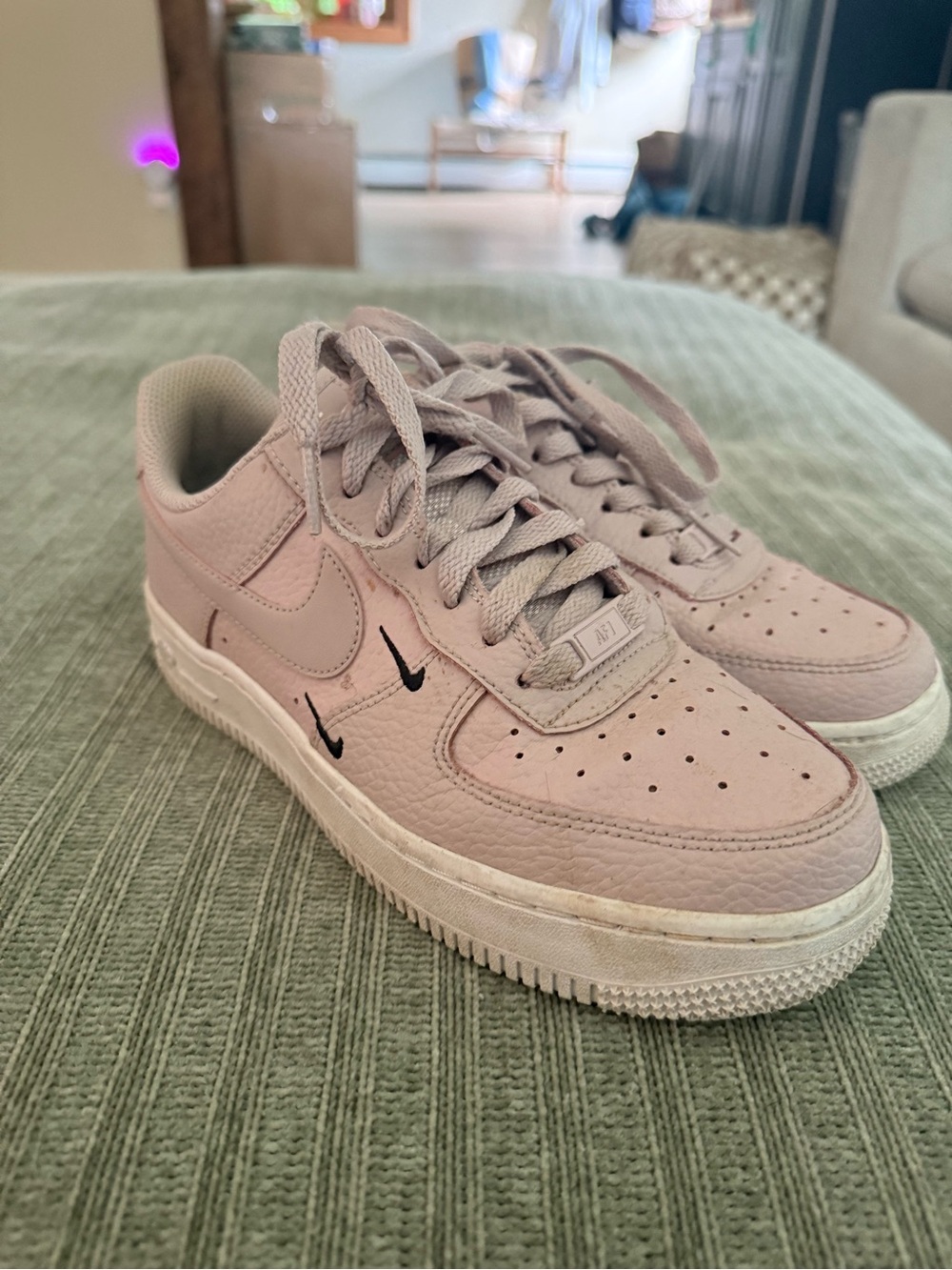 Nike Women’s Low-Top Sneakers in Pale Pink with Mini Black Swooshes